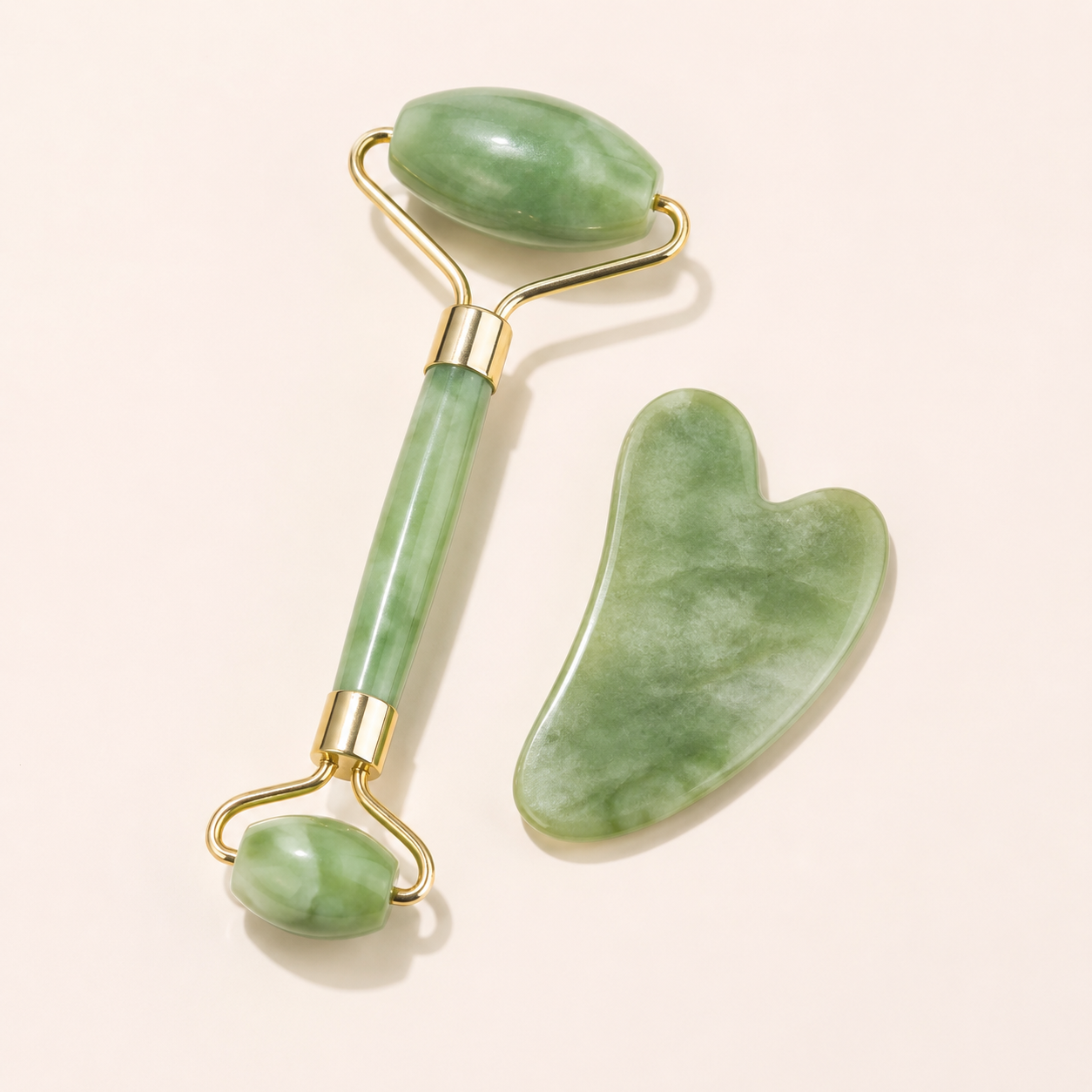 Green facial roller and gua sha skincare tool set